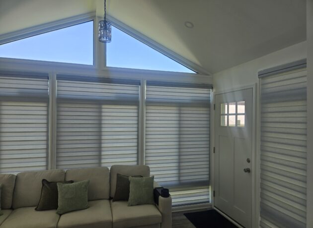 Modern zebra blinds with adjustable light control in a contemporary living room