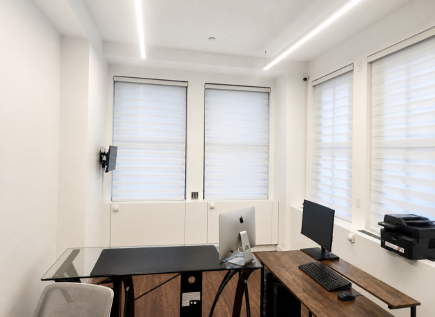 Custom Zebra shades installed in a modern office for privacy and daylight control