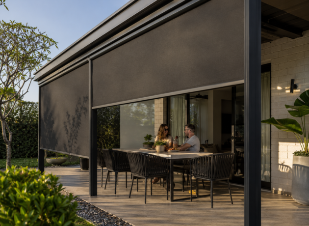 Motorized outdoor zip blinds for year-round weather protection