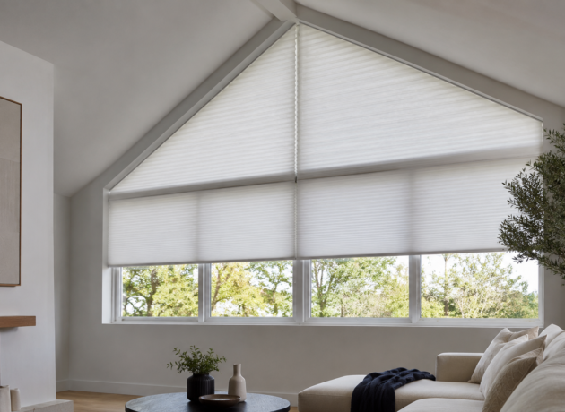 Motorized specialty shaped window shades for unique windows